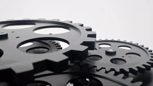 Rotating Gears Representing Interconnectedness and Industry