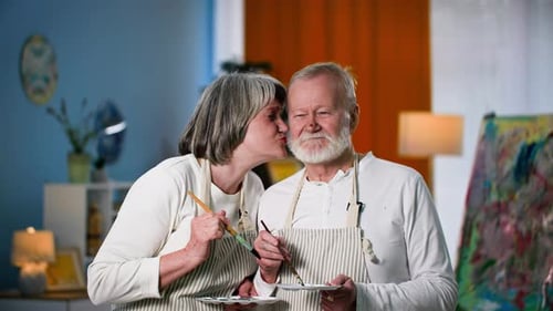 Senior Couple Enjoying Painting in Art Studio