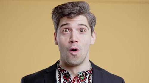 Man Expressing Surprise and Happiness