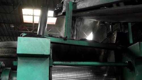 Old Tires Being Shredded in a Recycling Facility Turning Rubber Into Reusable Material for Various