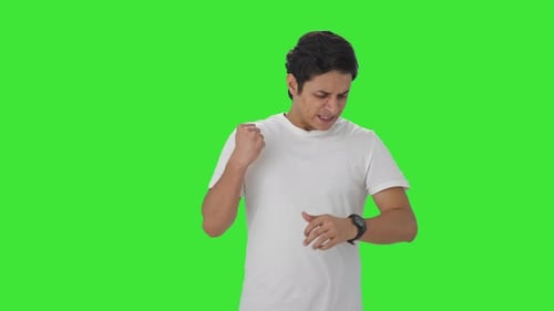 Angry Indian man waiting for someone Green screen