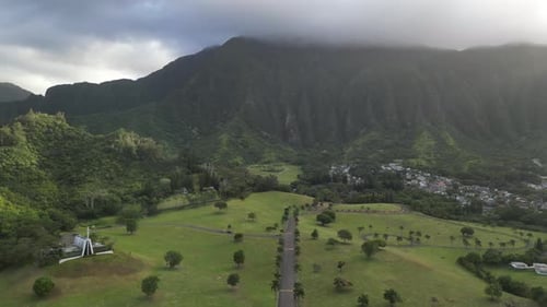 Lush Green Mountains and Tropical Fields Aerial