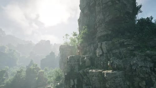 A Stunning Rocky Cliff with Lush Trees Perched on Top