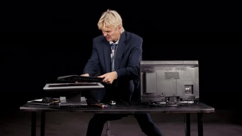 Frustrated Office Worker Destroys Screens Using Keyboard