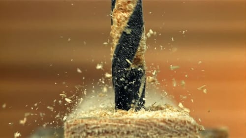 Drilling a Wooden Block in the Workshop Filmed on a Highspeed Camera at 1000 Fps