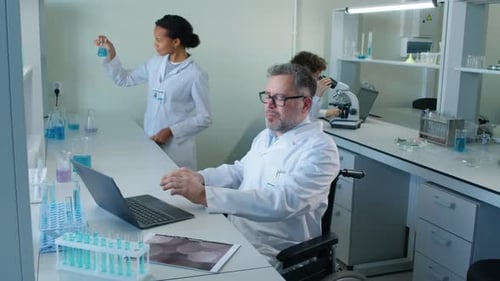 Scientists Celebrate Discovery in Bright Modern Laboratory