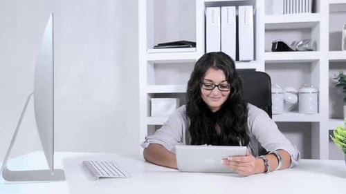 Attractive Modern Business Woman in Home Office Using Tablet Computer Adult