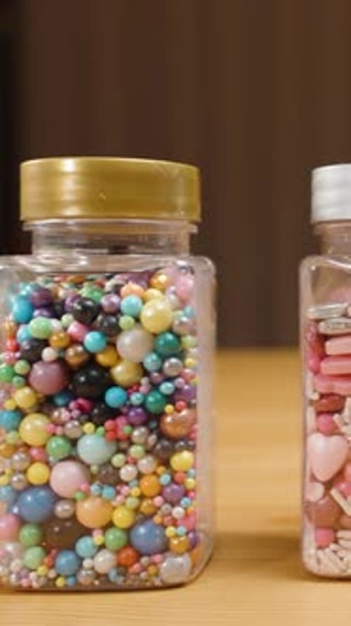 Assorted Colorful Candy Sprinkles in Jars