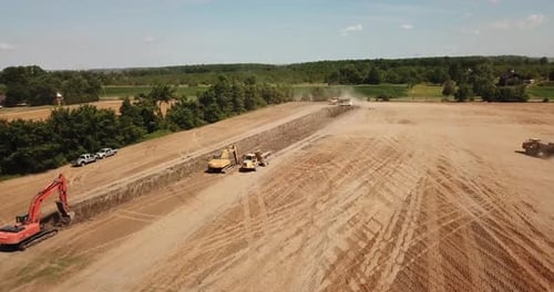 Drone shot of a land excavation site, greenhouse construction in Essex county, Ontario, Canada.