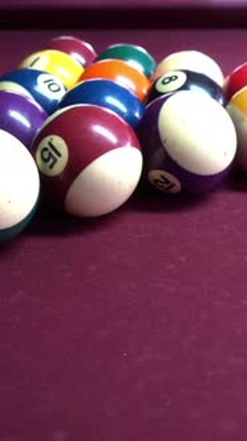 Vertical Video of billiard balls on a table