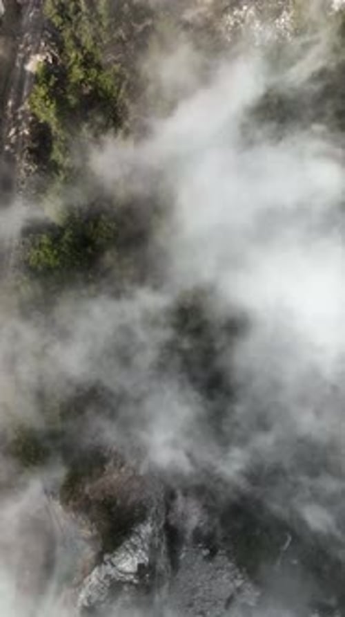 Vertical Video Cloudy Landscape in the Mountains Aerial View