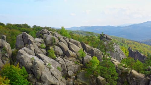 Aerial Beautiful Flight in Picturesque Landscape Large Stone Rocks Wild Woods and Mountain Scenery