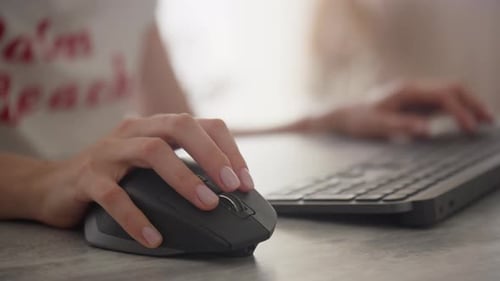 Closeup of Hand Using a Computer Mouse