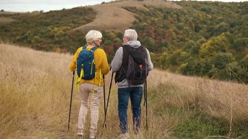 Senior Couple Hiking in Rural Environment