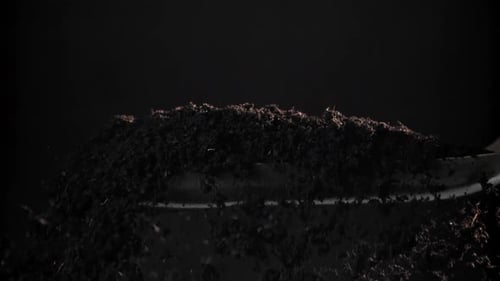 The Earth Falls From the Shovel Filmed on a Highspeed Camera at 1000 Fps