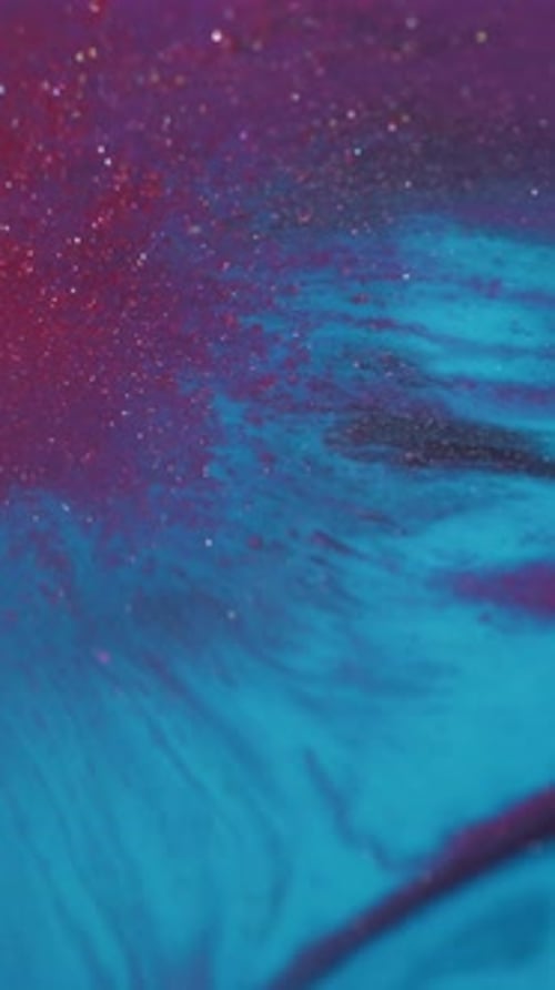 Abstract Swirls of Glittering Purple, Red, and Blue