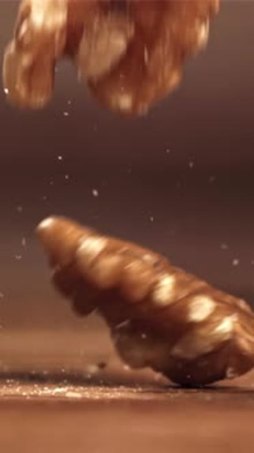 Walnuts Fall on the Table Filmed on a Highspeed Camera at 1000 Fps