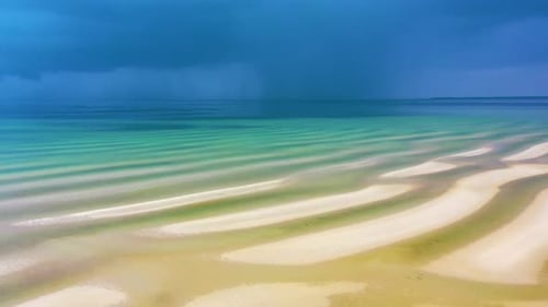 Cape Cod Drone View of Low Tide Beach with Storm Clouds Rolling In