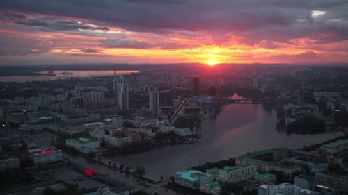 An Absolutely Stunning Sunset Over the City with a Beautiful River and Majestic Skyline