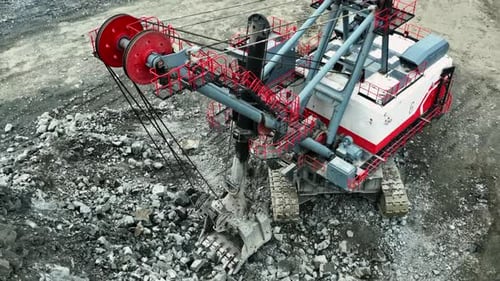 Giant Excavator Gathering Rocks in a Quarry Stock Clip
