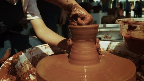 Shaping A Clay Pot In A Ceramics Workshop 54