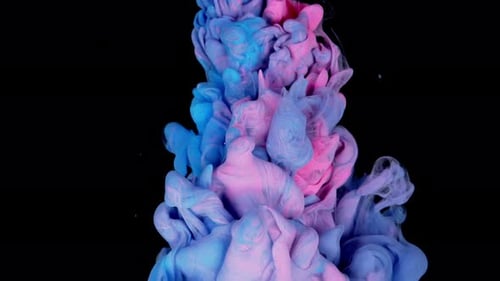 Magic Mixing of Color Mesmerizing Interplay of Colorful Pink and Blue Ink in Water on Black