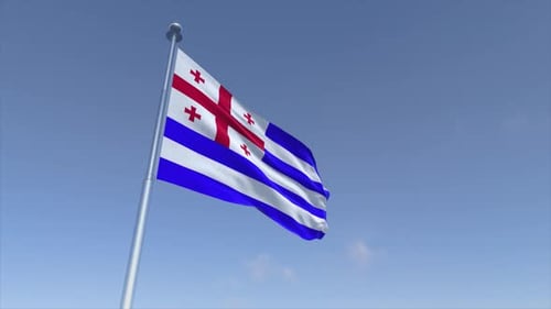 Flag of Ajara Waving Against a Clear Blue Sky