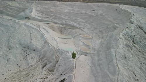 Approaching Aerial View of Pamukkale's Travertine Terraces