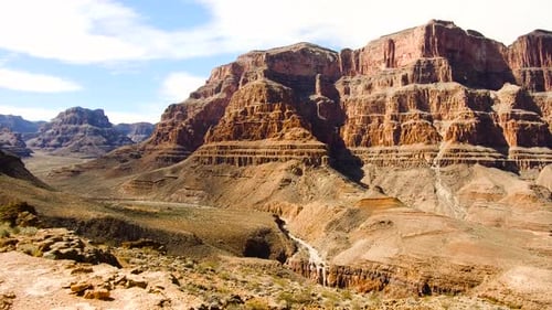 Grand Canyon cliffs and arid Colorado river bed breathtaking aerial view from helicopter
