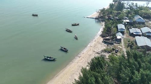 Serene Coastal Village and Fishing Boats An Aerial Perspective View
