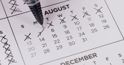 Marking Days Off on August Calendar Page