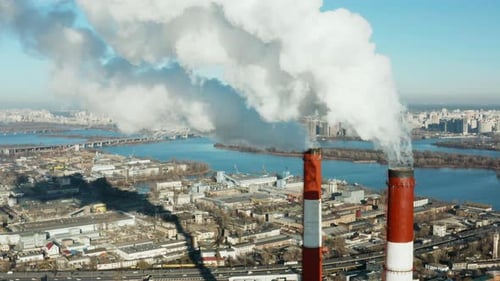 Pollution of the environment: a pipe with smoke. Power Plant.