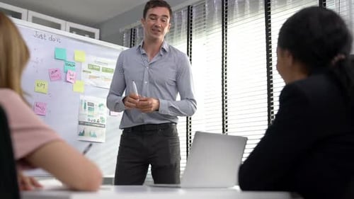 Competent Office Workers From Various Nationalities in the Meeting Room