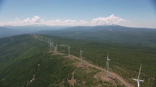 Cascade Mountains, California Circa-2019. Aerial Shot Of Wind Turbines. Shot From Helicopter With...