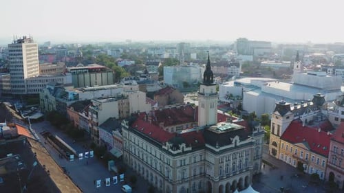 Novi Sad city roofs and church in fog