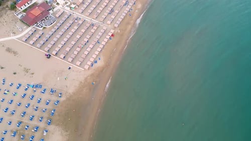 Beach with umbrellas and loungers