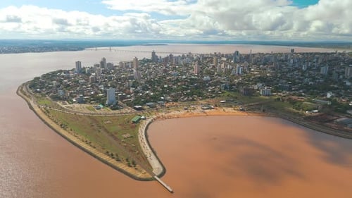 Bird's-eye view of the city of Posadas, gracefully nestled along the curves of the mighty Rio Paraná