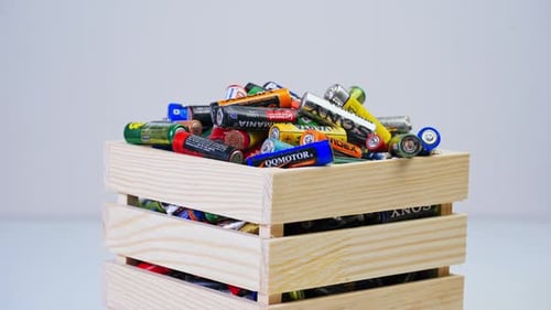 Wooden Crate Full of Used Batteries