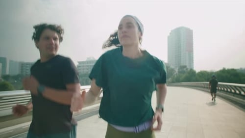Couple on Morning Run in City