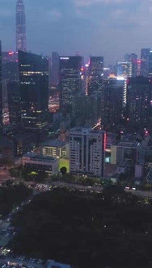 Shenzhen Skyline at Night Futian District China Aerial View Vertical Video