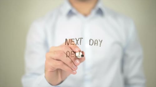 Next Day Delivery Man Writing on Transparent Screen
