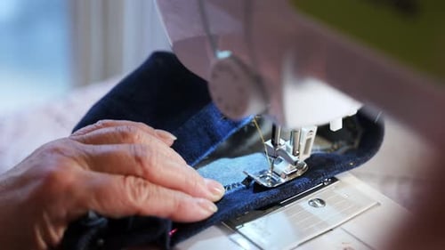 Sewing Machine Stitching Zipper on Fabric or Home Garment Making and Tailoring Process in Workshop