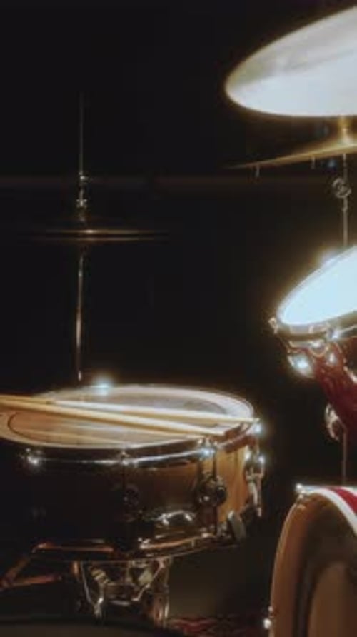 Dramatic Lighting on a Drum Kit Vertical