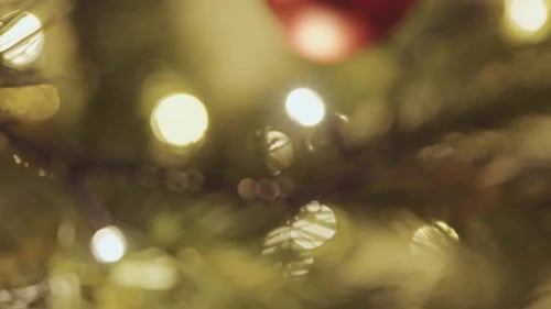 Festive Christmas Tree Bokeh Lights and Ornaments