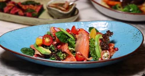 Fresh Gourmet Salad with Smoked Salmon Cherry Tomatoes Pomegranate