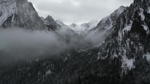 Aerial video of snowy mountains Aigestortes Spain