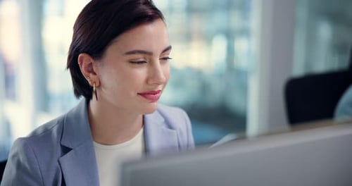 Business Woman Working at Computer in Modern Office