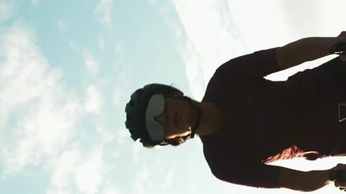 Portrait of female cyclist riding bicycle