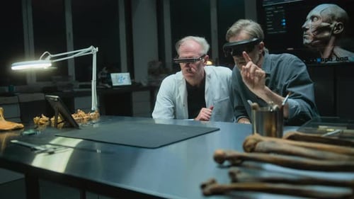 Scientists Examining Bones with Augmented Reality Glasses in Lab