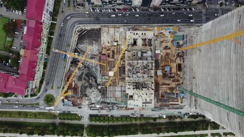 Aerial View the Building Construction. Aerial View Of City Development. Skyscraper Building Process
